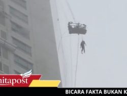 1 Pekerja Tergantung Diluar Apartemen Surabaya Saat Hujan